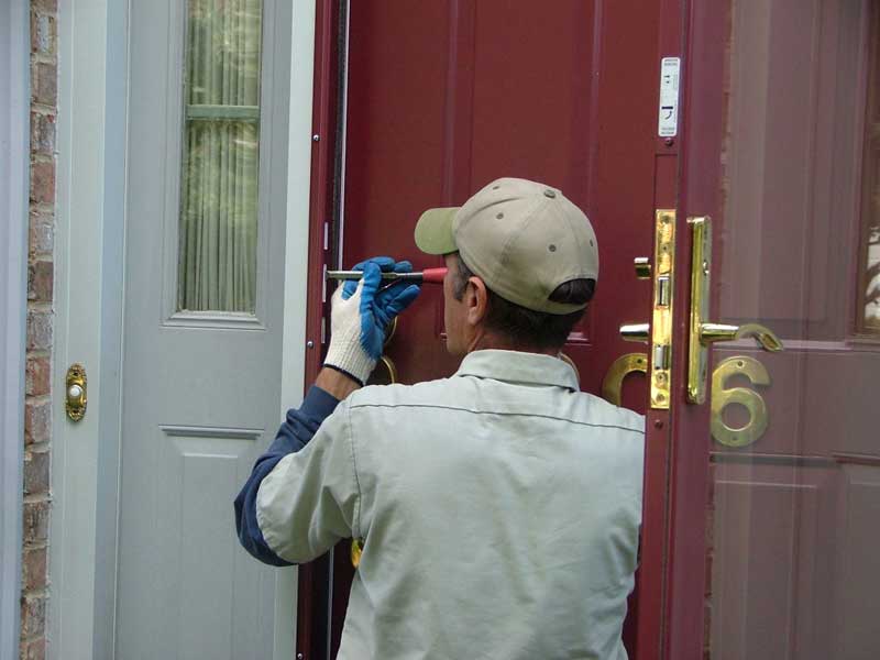 PJ Fitzpatrick repairing a door latch