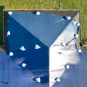 How to Safely Tarp a Roof