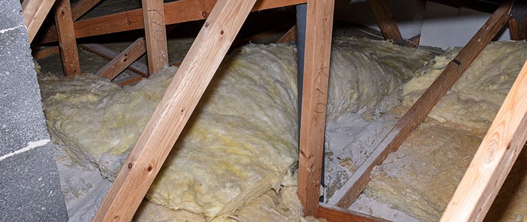How Attic Insulation Impacts Roof Performance and Energy Bills