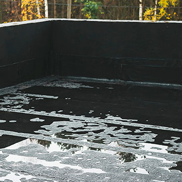 How to Fix Water Pooling on Flat Roofs